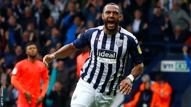 Matt Phillips celebrates scoring against Huddersfield