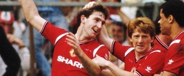 Norman Whiteside celebrates scoring the extra-time winner against Everton in the 1985 final