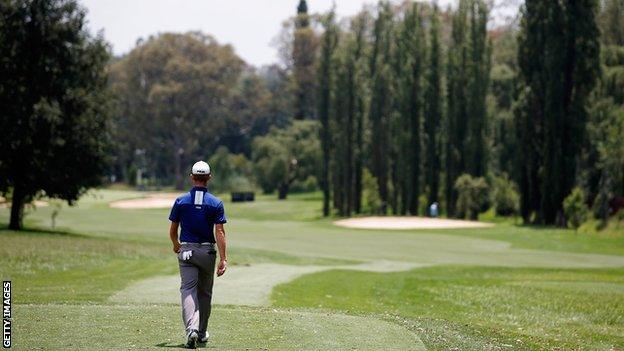 Brandon Stone of South Africa walks down the fairway after he hits his tee shot on the 3rd hole during Day Three of the Joburg Open at Royal Johannesburg