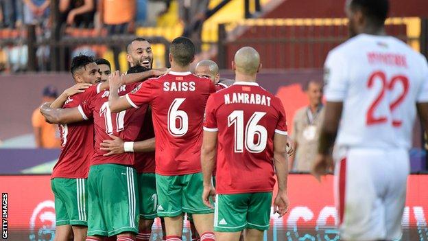 Morocco players celebrate their victory over Namibia