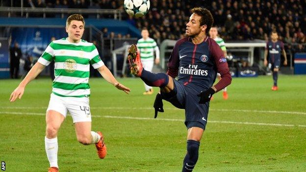 James Forrest watches on as Neymar controls the ball