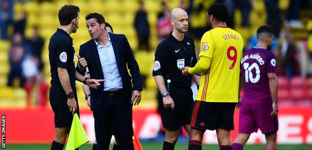 Derby City manager Marco Silva with Watford striker Troy Deeney