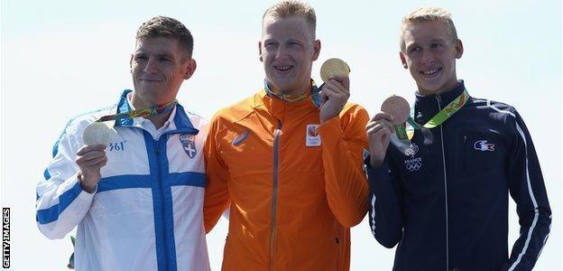 Ferry Weertman (centre) took gold, from Spiros Gianniotis (left) and Marc-Antoine Olivier (right)