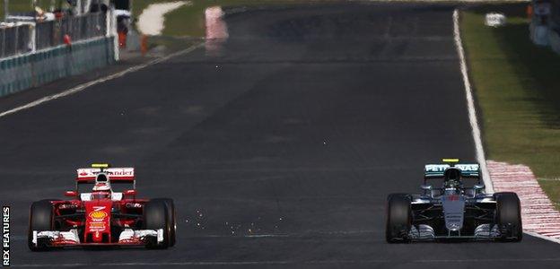 Kimi Raikkonen and Nico Rosberg at the Malaysian Grand Prix