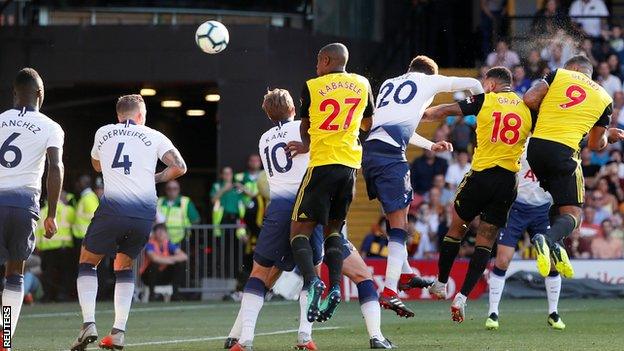 Troy Deeney scores against Tottenham