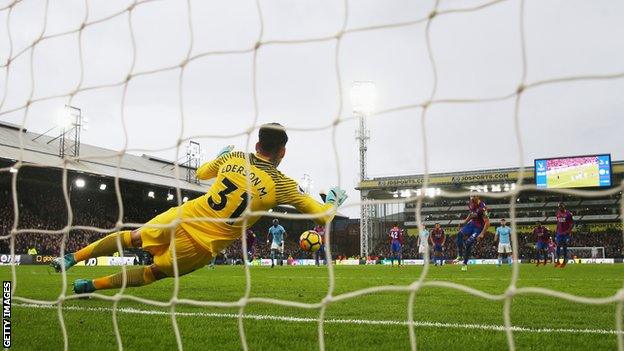 Ederson saves the injury-time penalty that could have condemned Manchester City to their first defeat of the season.