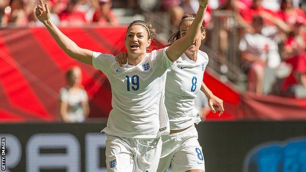 Jodie Taylor celebrating with Jill Scott