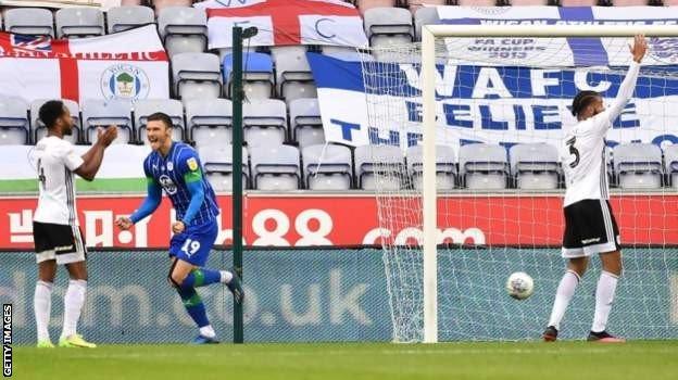 Kieffer Moore celebrates his first-half goal against Fulham