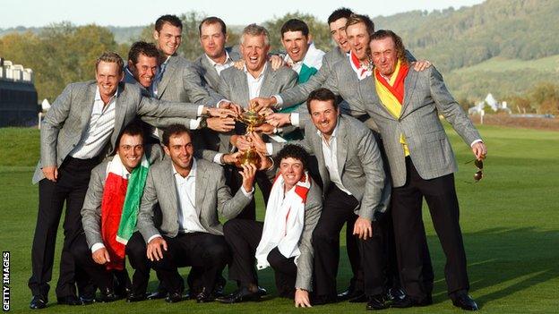 Edoardo Molinari and Graeme McDowell are pictured with their European Ryder Cup-winning team-mates in 2010