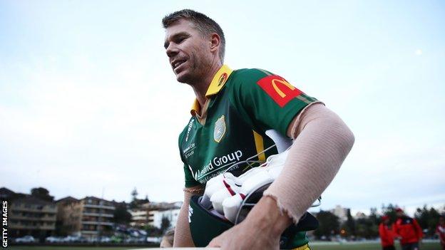 David Warner walks off the field