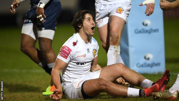 Facundo Cordero celebrates after scoring a try under the posts