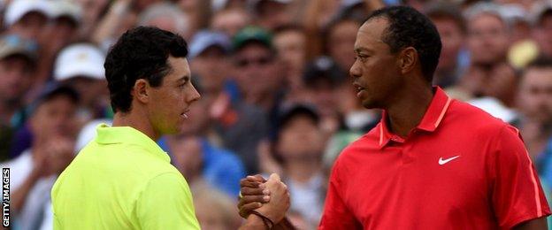 Rory McIlroy shakes hands with Tiger Woods after the final round of the 2015 Masters