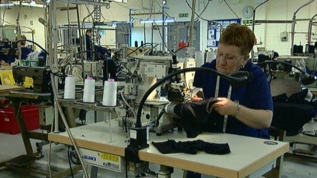 woman working at sewing machine