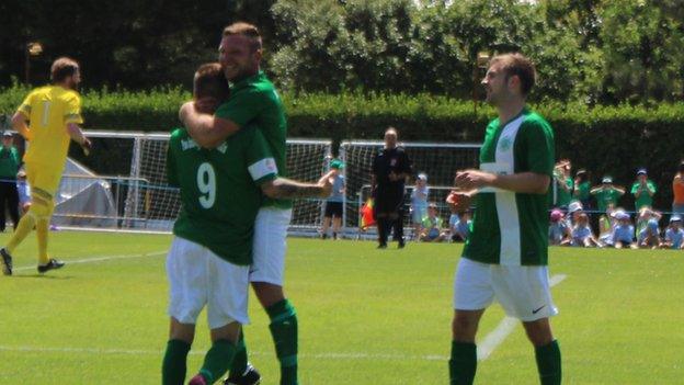 Guernsey celebrate Marc McGrath's penalty