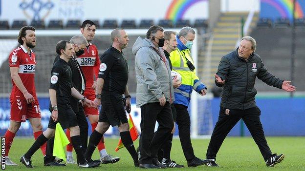 Neil Warnock (right) complains to the match officials after Swansea City's dramatic win over Middlesbrough