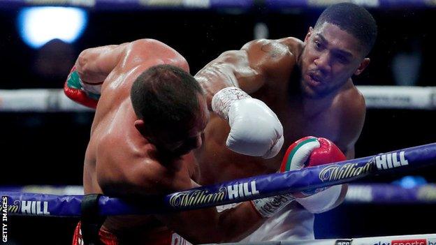 Anthony Joshua punches Kubrat Pulev