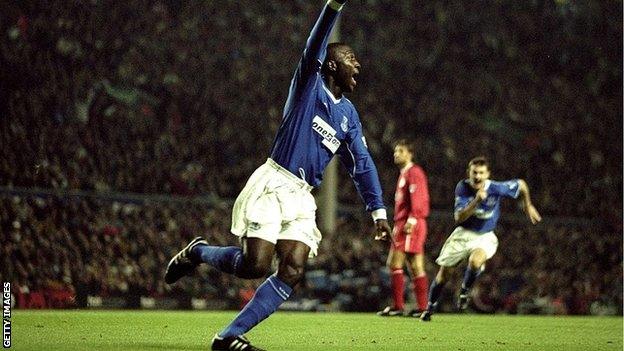 Kevin Campbell of Everton celebrates his goal at Liverpool in 1999