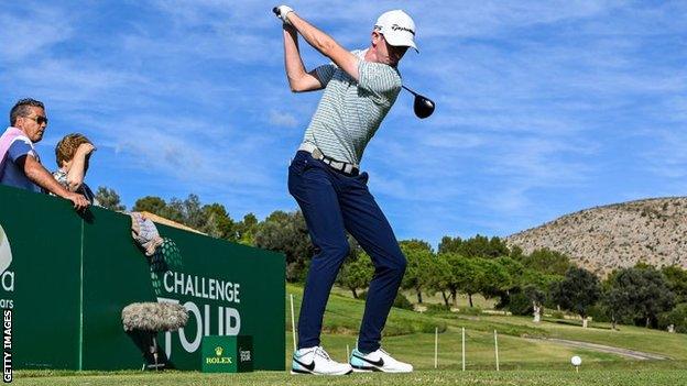 Tom McKibbin hits his opening tee shot on Sunday at the Challenge Tour Grand Final in Majorca