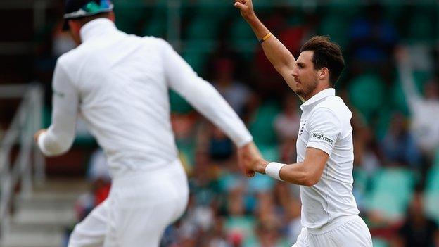 Steven Finn celebrates a wicket