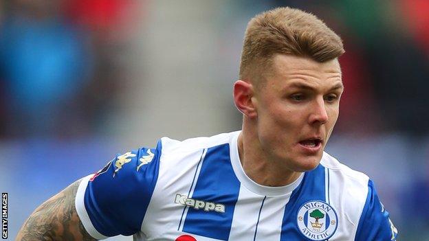 Max Power plays for Wigan in the FA Cup in 2018