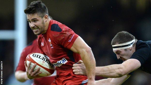 Rhys Webb is tackled by Brodie Retallick in 2014