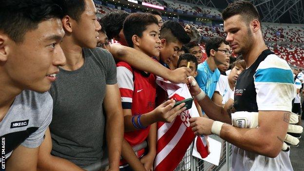 Daniel Bachmann signs autographs with Stoke City in Singapore this summer