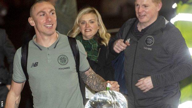 Celtic captain Scott Brown and manager Neil Lennon with the League Cup trophy