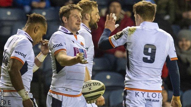 Edinburgh's James Johnstone (left) celebrates with Henry Pyrgos