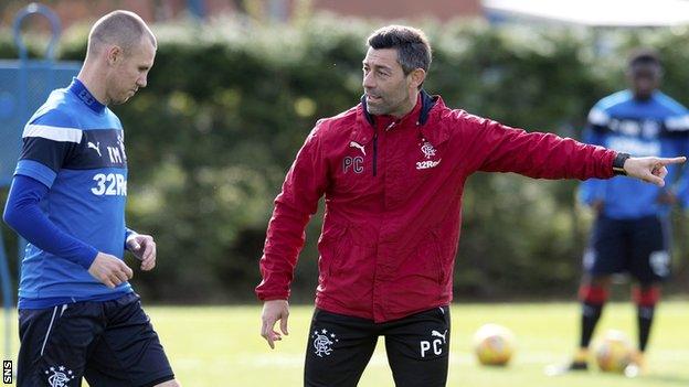 Kenny Miller and Pedro Caixinha on the training ground