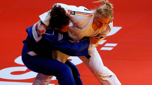 Britain's Natalie Powell in action (in blue)