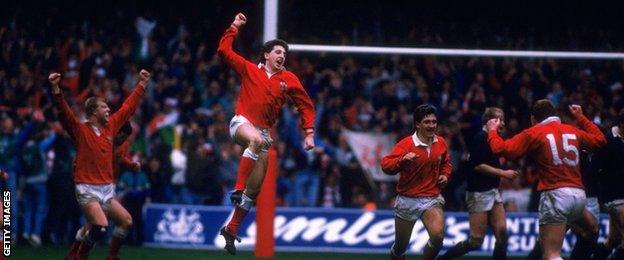 Jonathan Davies jumps high in celebration after scoring for Wales against Scotland in 1988