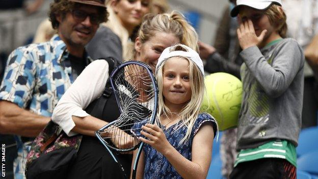 Young fan holds Alexander Zverev's destroyed racquet at the Australian Open