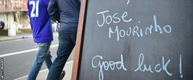 A cafe sign wishes Jose Mourinho good luck outside Stamford Bridge