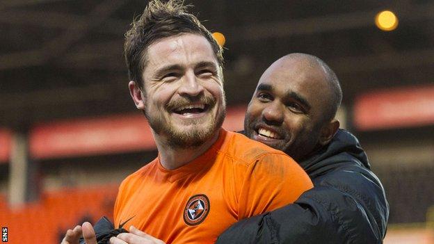 Dundee United's Paul Paton celebrates with Florent Sinama-Pongolle