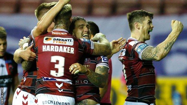 Sam Powell celebrates his try