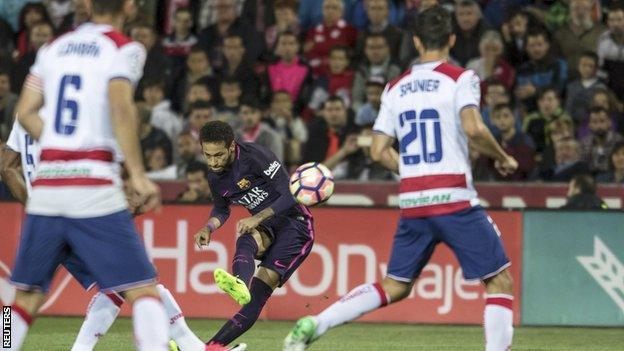 Neymar takes a shot for Barcelona against Granada