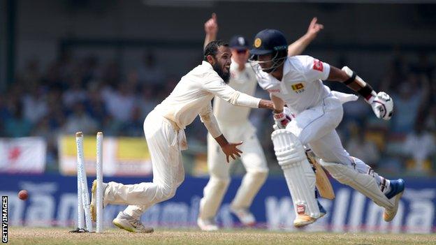 England spinner Adil Rashid celebrates as Sri Lanka batsman Kusal Mendis is run out by Jack Leach (not pictured)