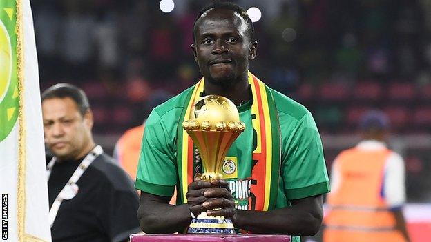 Sadio Mane with the Africa Cup of Nations trophy