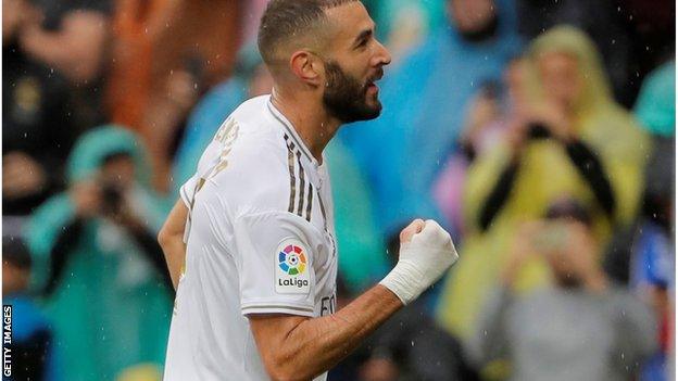 Karim Benzema celebrates scoring for Real Madrid against Levante