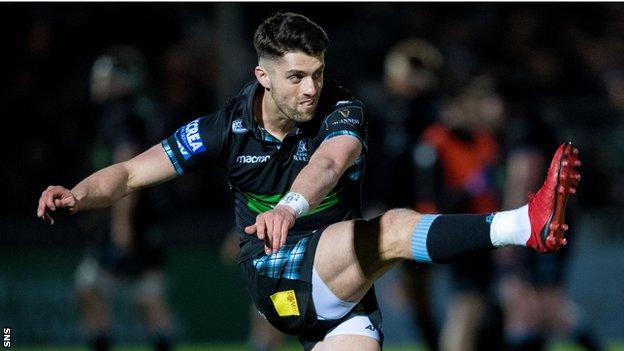 Adam Hastings slots a kick for Glasgow