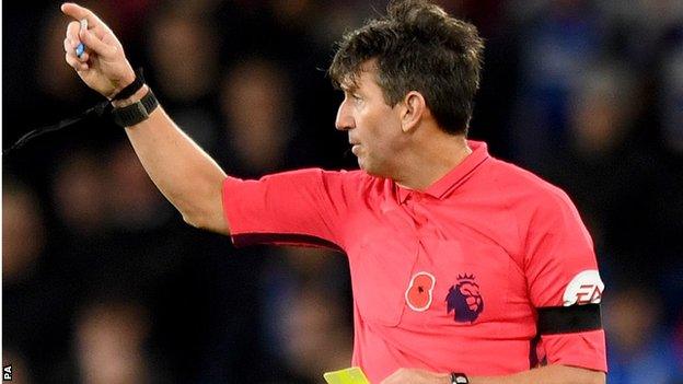 Referee Lee Probert showed a yellow card to Demarai Gray after Leicester's 55th-minute winner