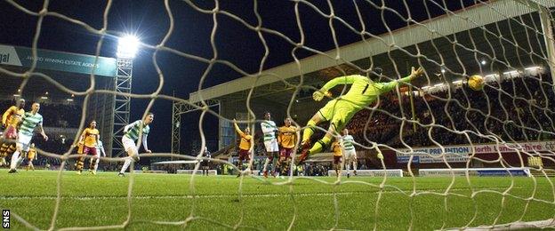 Mikael Lustig scores an own goal to give Motherwell the lead against Celtic