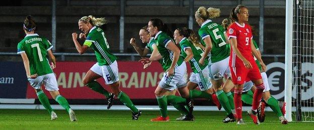 Ashley Hutton scores against Wales