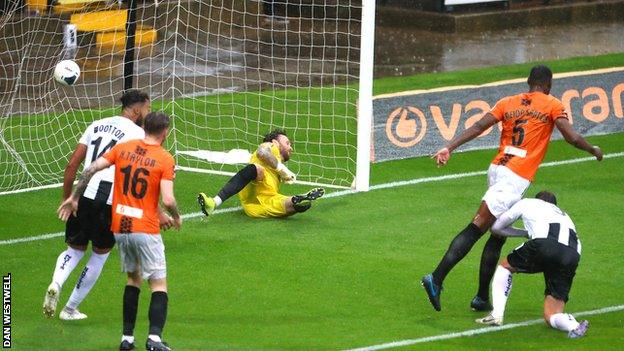 Kristian Dennis scores for Notts County against Barnet