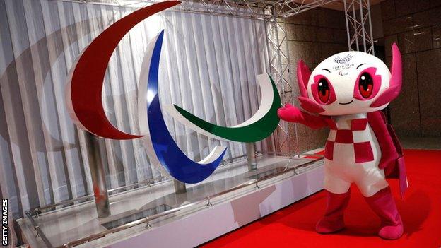 The Paralympic mascot Someity with the Agitos logo