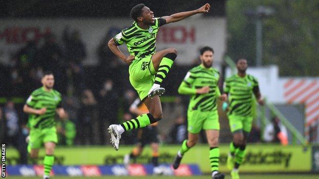 Ebou Adams celebrates after marking his return from suspension with the opening goal