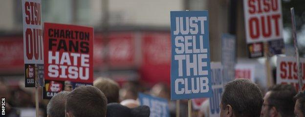 Charlton and Coventry protest signs