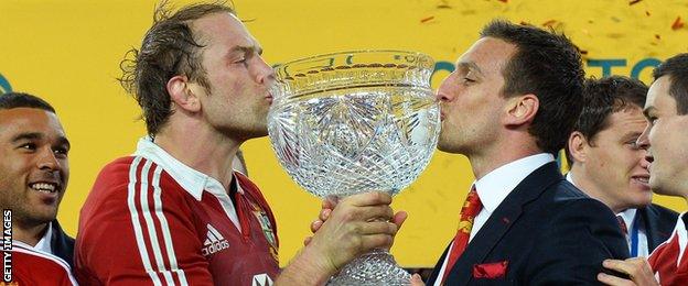 Alun Wyn Jones and Sam Warburton kiss the trophy after the British and Irish Lions beast Australia in 2013