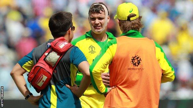 Australia wicketkeeper Alex Carey is bandaged up during the 2019 World Cup game against England