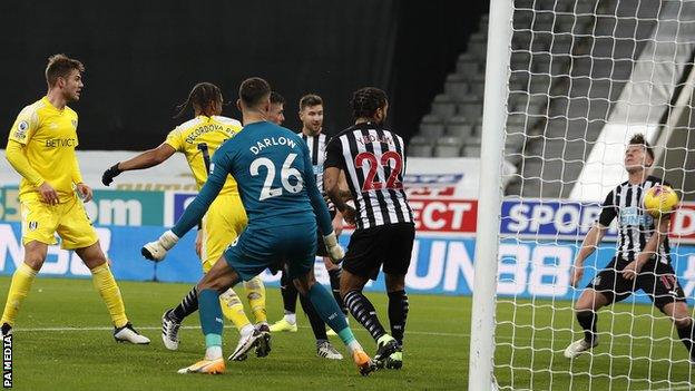 Fulham score thanks to a Matt Ritchie (right) own goal